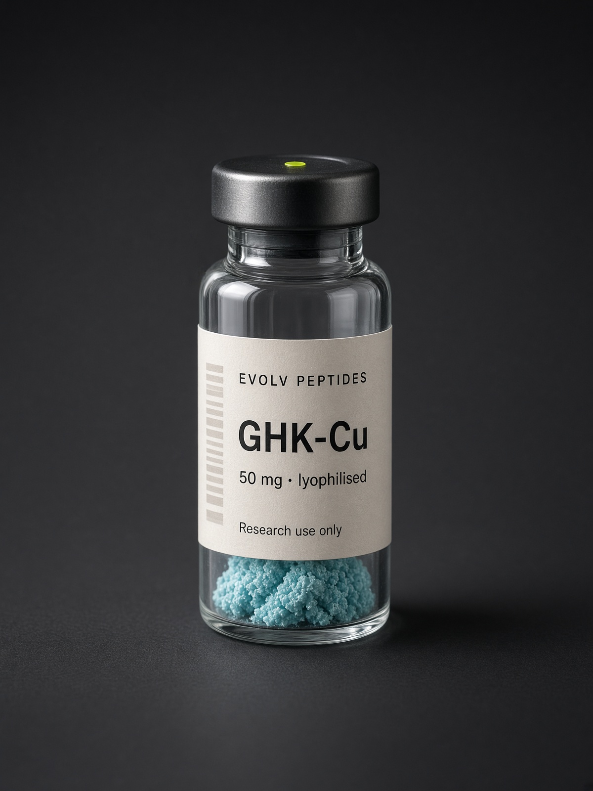 Sealed lyophilised research vial of EVOLV GHK-Cu 50 mg on a dark studio ground