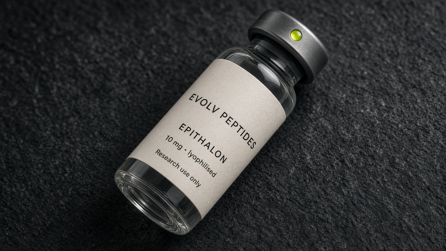 Close crop of an EVOLV research vial label on dark stone, showing lot space and the four-bar mark